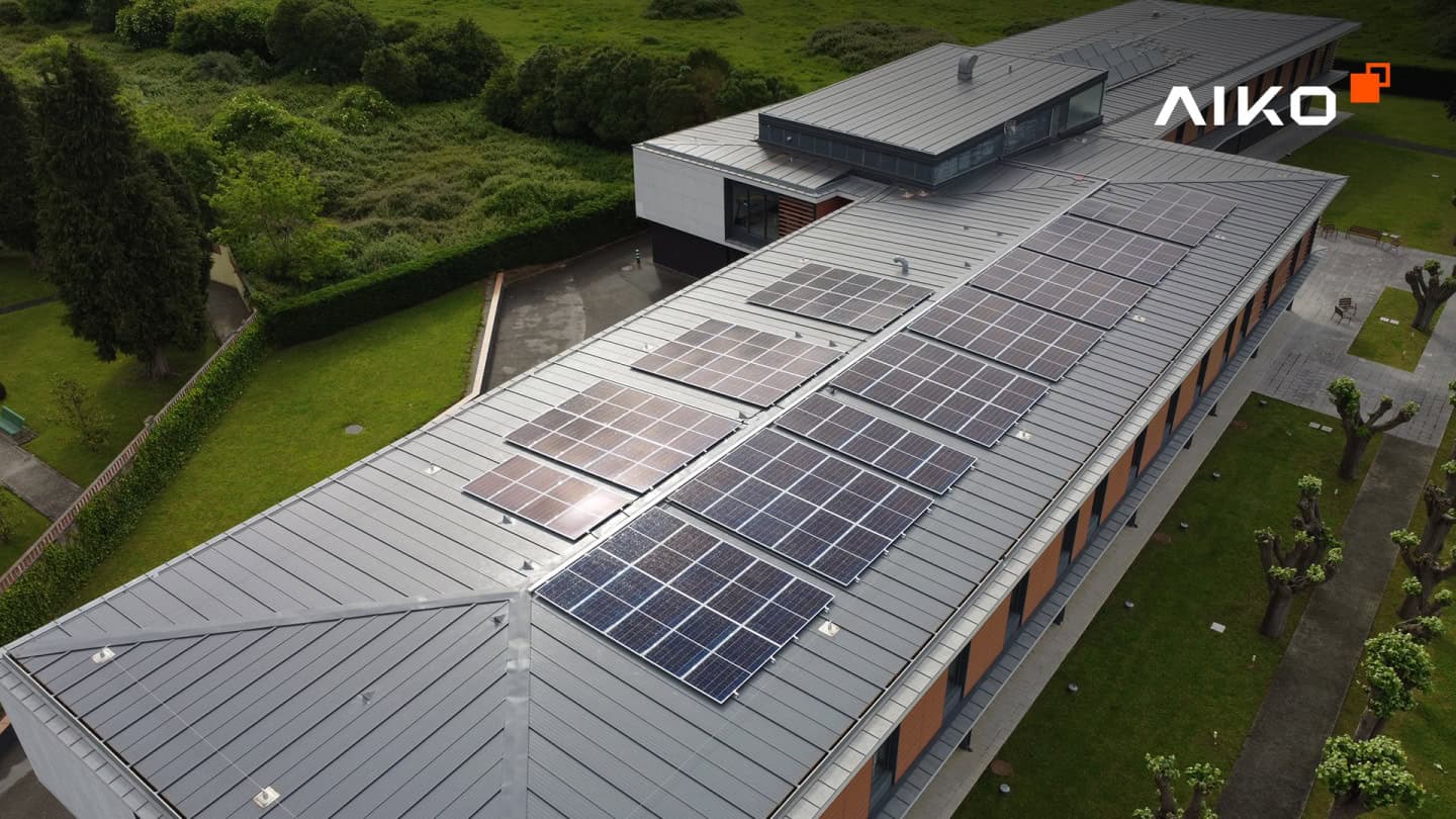 Drone photo of Aiko Neostar 2P solar panels installed within a small commercial premises