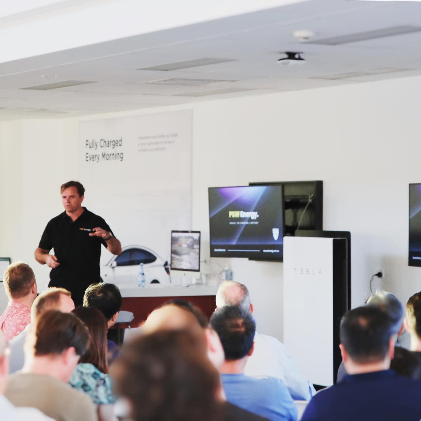 Perth Solar Warehouse team at a Tesla tech talk
