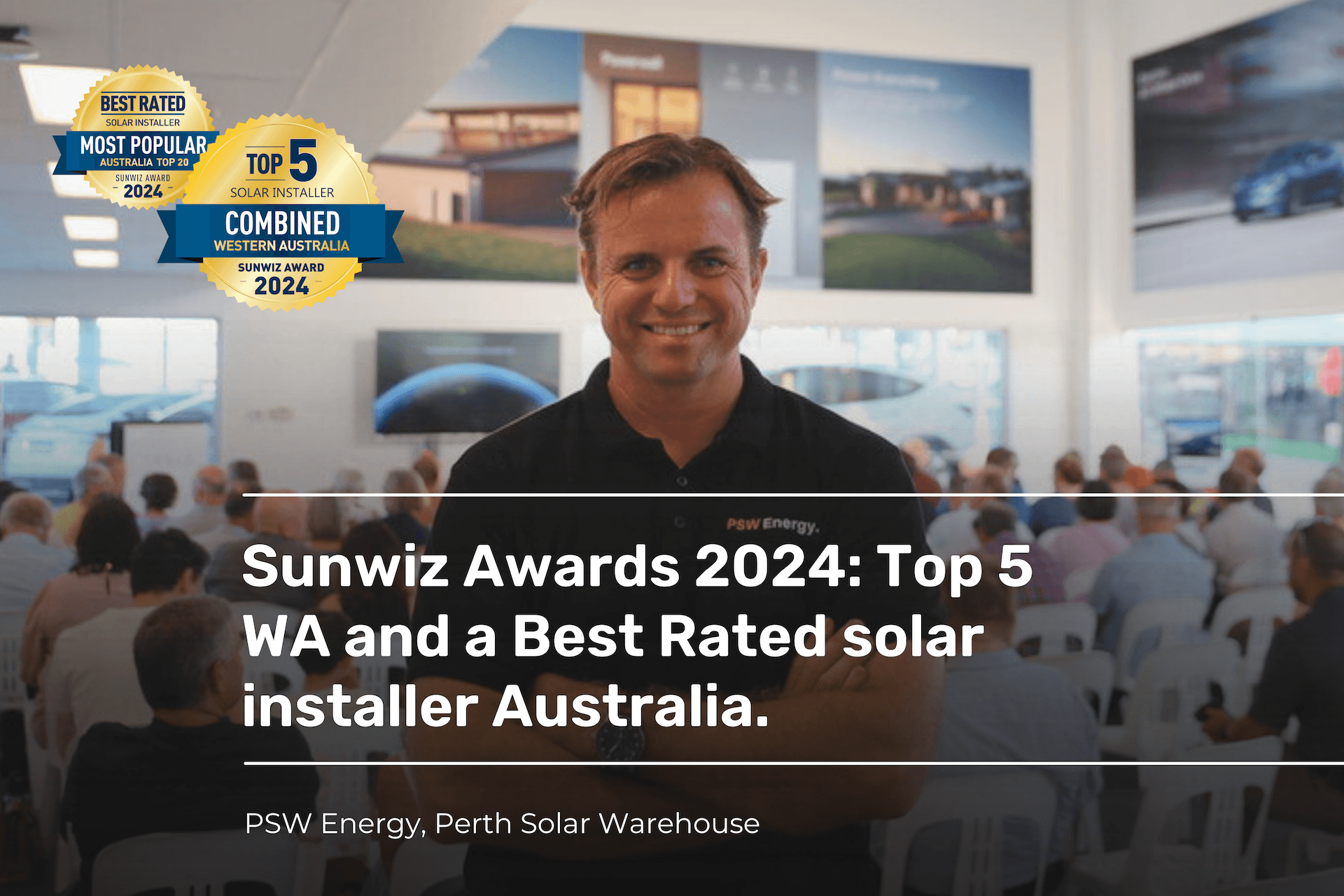 Sunwiz Awards 2024 with Derek McKercher in the foreground standing infront of a room full of people with arms crossed and smiling. Sunwiz Awards logos featured in the top left corner