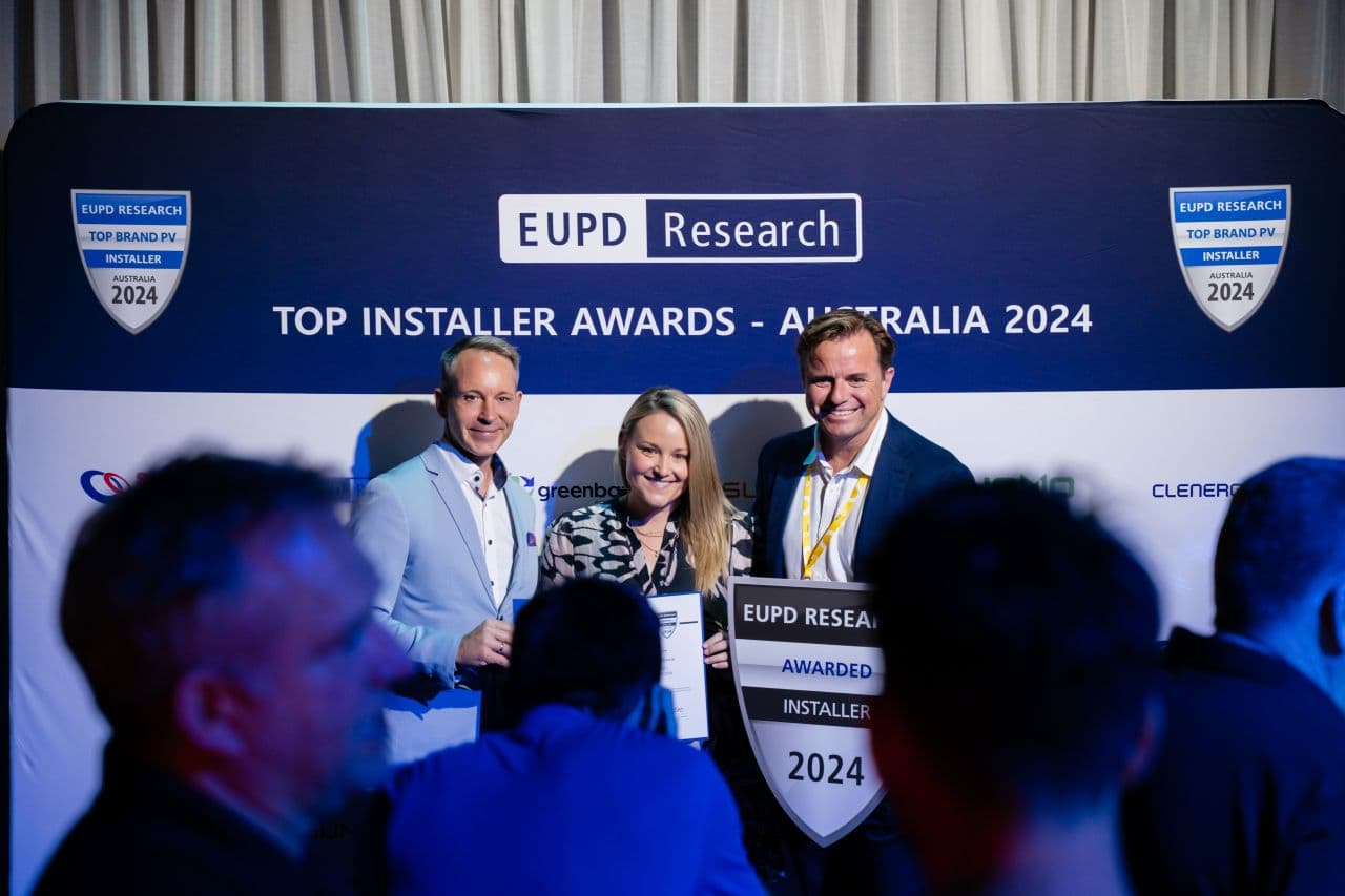 EUPD Research Top Installer Awards 2024 presentation banner (left to right): Daniel Fuchs, Nicole Bilman and Derek McKercher holding the EUPD Installer Award 2024 shield